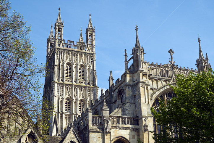 Architectural detail on the tower of Gloucester cathedral in spring sunshine, Gloucestershire, UK